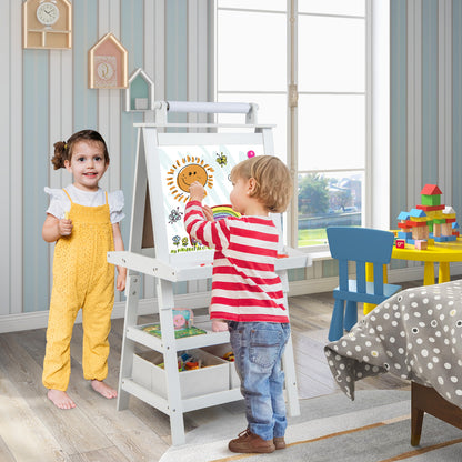 A young girl and boy happily drawing on the white art easel in a bright playroom