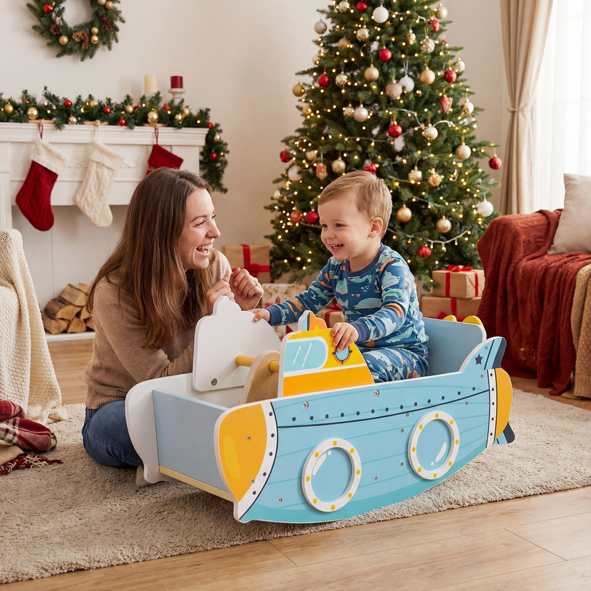 A mother and her son playing with the climbing frame in a living room at Christmas
