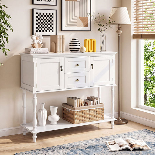 White console table with two drawers and two cabinets in a living room setting