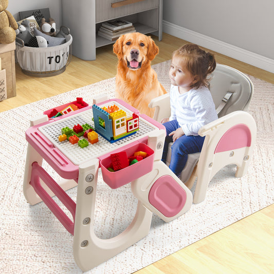 This pink and white baby high chair is assembled as a table and chair set with building blocks