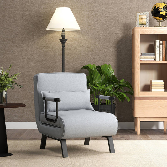 The sofa bed placed in a cosy living room setting next to a floor lamp and wooden bookshelf