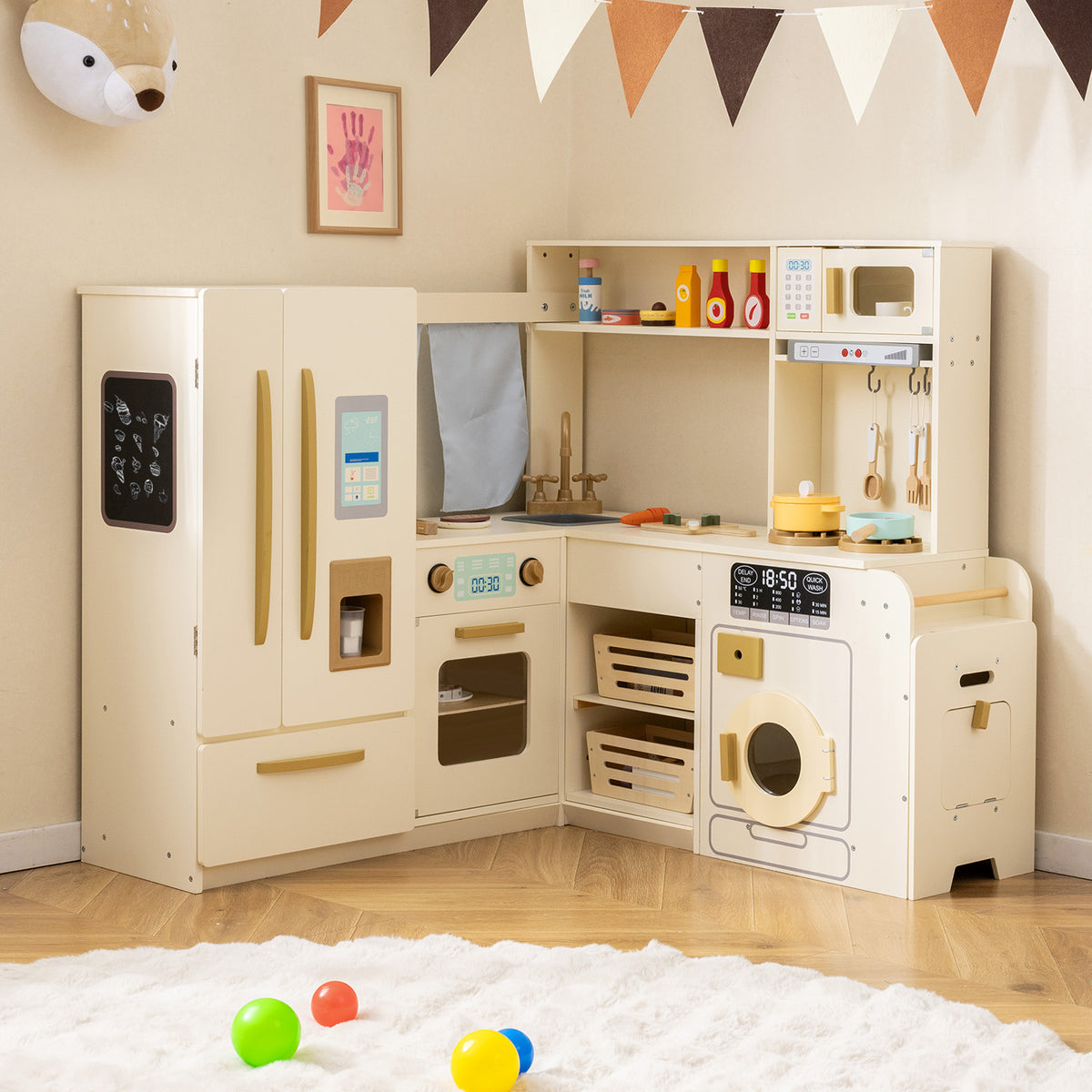 The play kitchen set placed in a child's bedroom with bunting and a rug