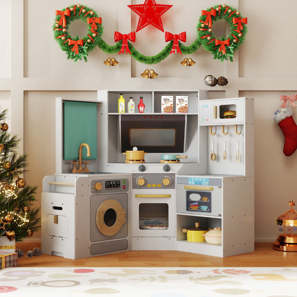 The corner play kitchen set is shown in a festive room with Christmas decorations