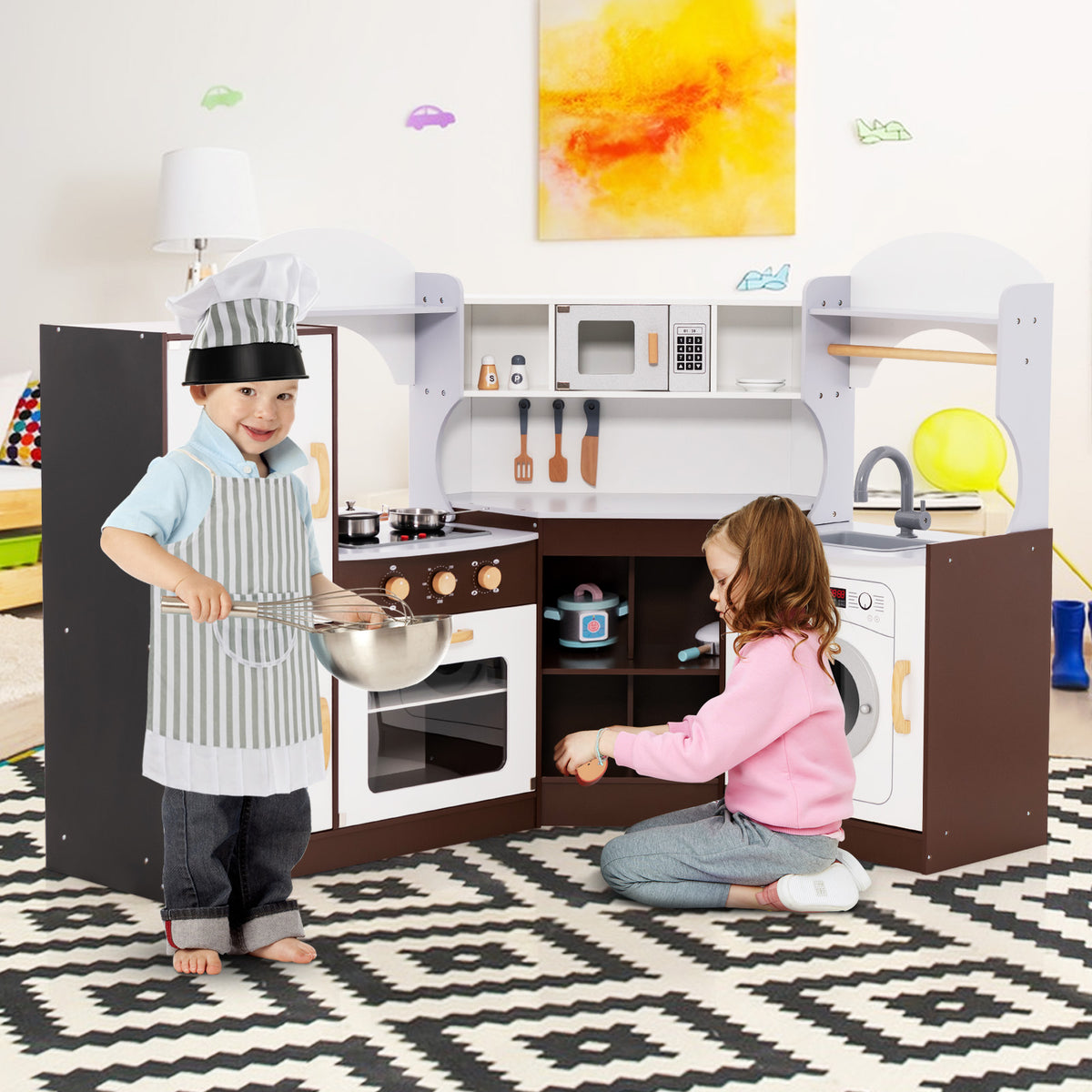 Children playing with the corner play kitchen set in a room