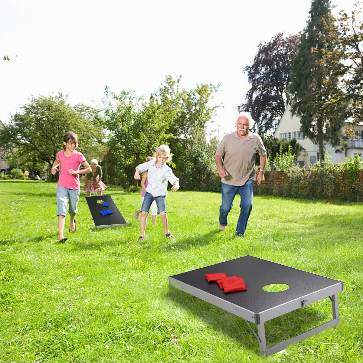 Two families playing the lawn game in a garden