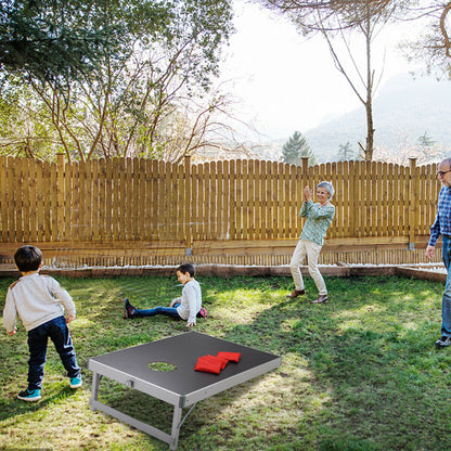 Grandparents playing the lawn game in a garden
