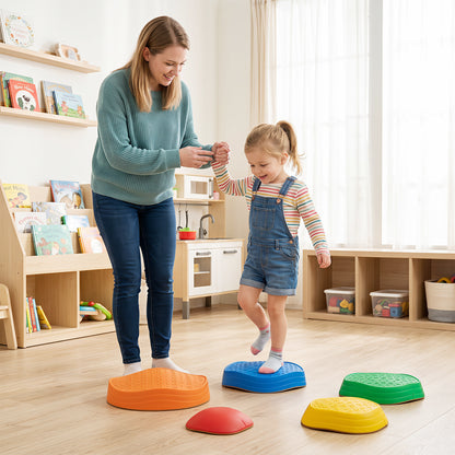 A woman helping a child step on the toy sports stepping stones indoors