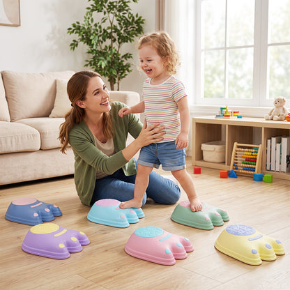 A mother and child interacting with the monster stepping stones indoors