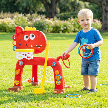 A young boy playing with the red dinosaur activity centre in a garden