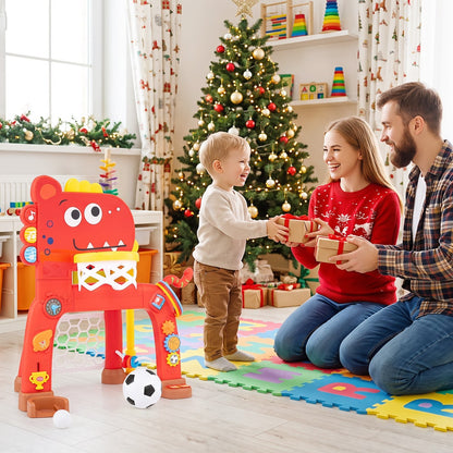 A family giving gifts in front of a Christmas tree with the red dinosaur activity centre