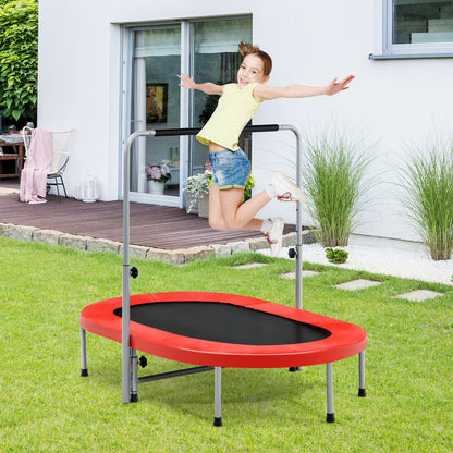 The fitness trampoline being used by a young girl jumping in a garden setting
