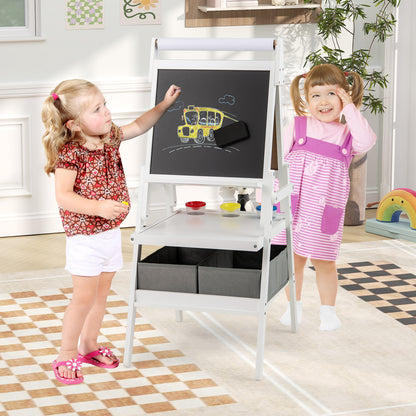 Two young children using the double-sided kids art easel with chalk and magnetic letters