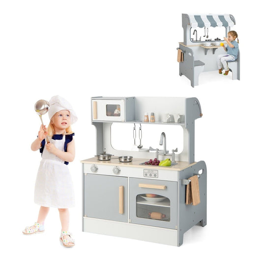 Double Sided Kids Kitchen Playset with Microwave Sink Oven a grey and white wooden toy kitchen with a child playing