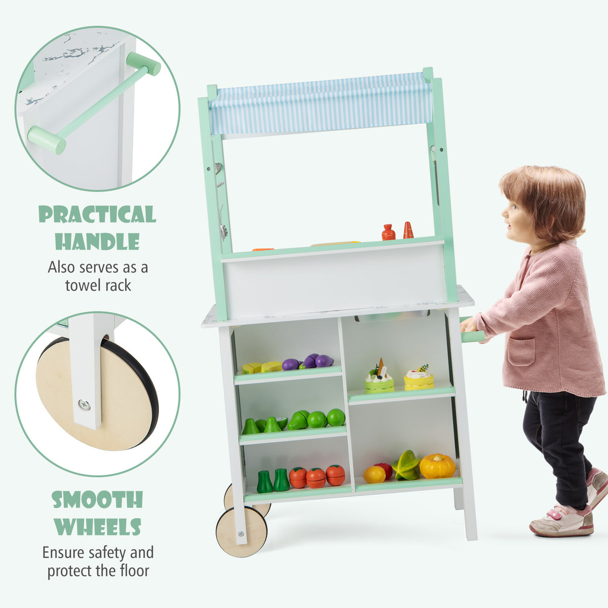 Close up of the play kitchen set showing smooth wheels and a towel rack