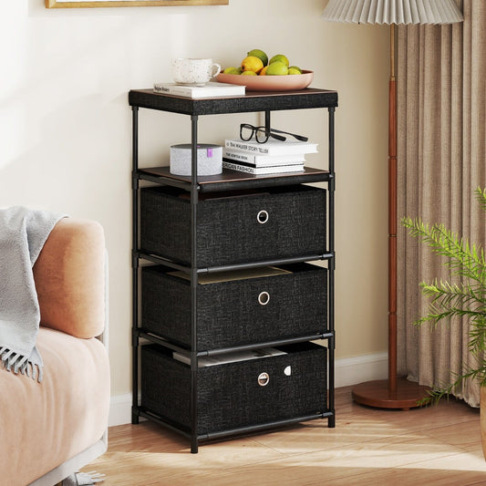 The black metal frame dresser with three fabric drawers is placed next to a sofa in a living room setting