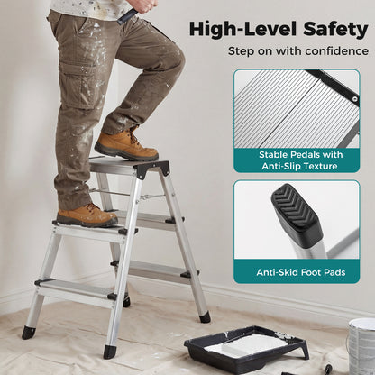 Close-up of the anti-slip pedals and foot pads on the silver step stool