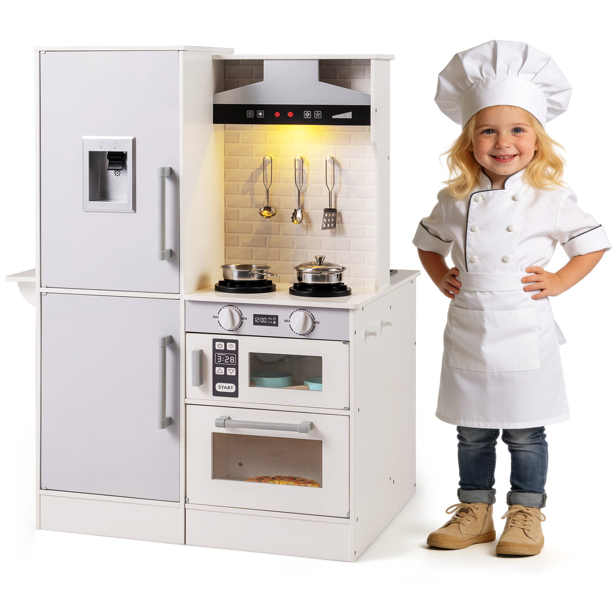 Child in chef outfit standing next to the play kitchen