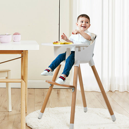 This modern padded highchair is shown in a dining room with a child sitting at a table
