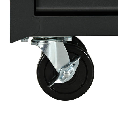 A close-up view of one of the black caster wheels on the tool cabinet