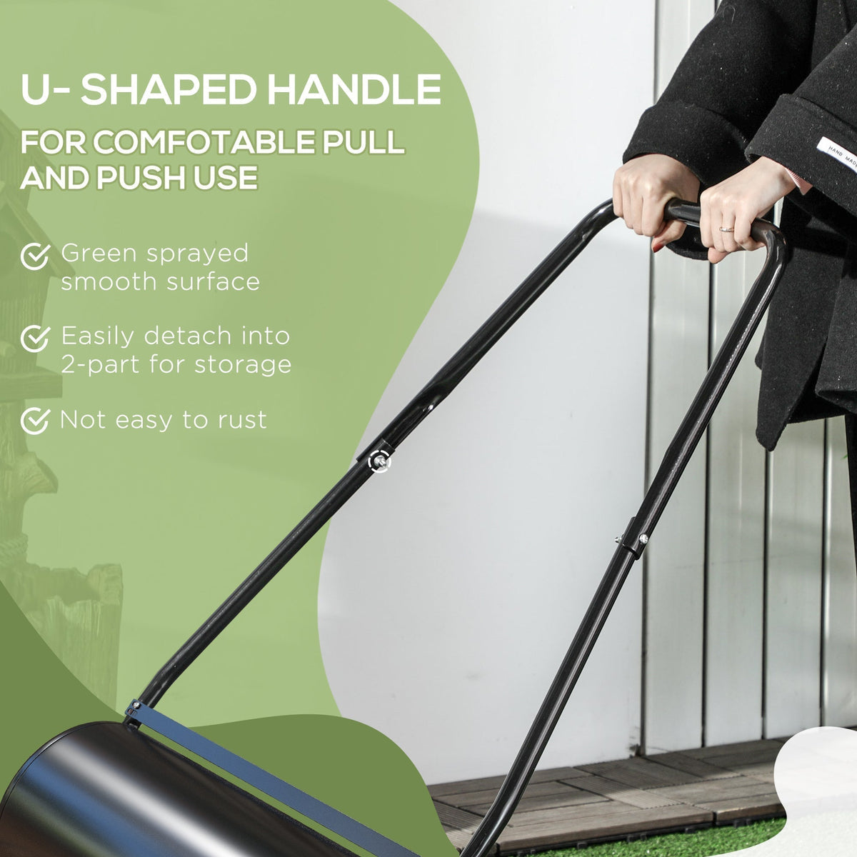 Close up of the garden lawn roller handle showing its U-shape and smooth surface