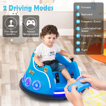 A boy holding a remote control for the kids electric bumper car