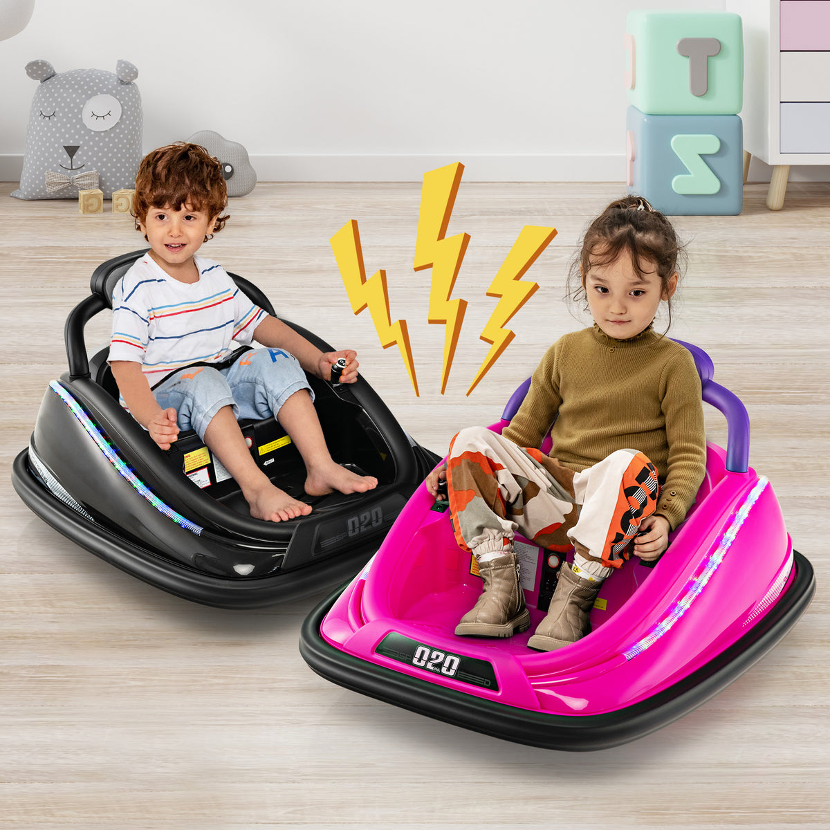 Two children enjoying the black and pink electric bumper cars in a room