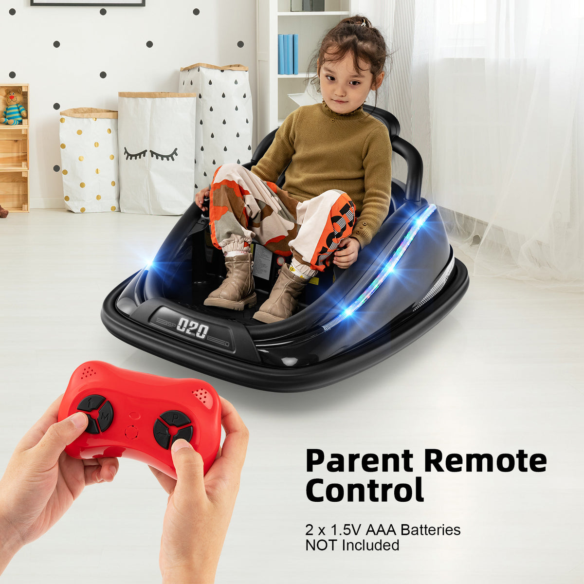 Parent holding a red remote control for the black electric bumper car with a child inside