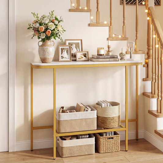 Console table with faux marble top and golden metal frame, styled in a hallway with baskets underneath