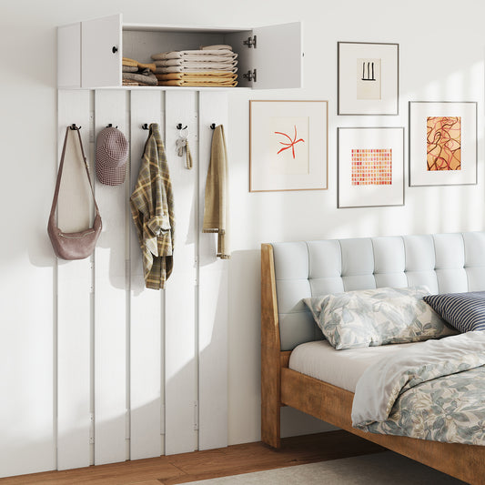 The coat rack with cabinet is shown in a bedroom setting with items on the hooks and in the cabinet