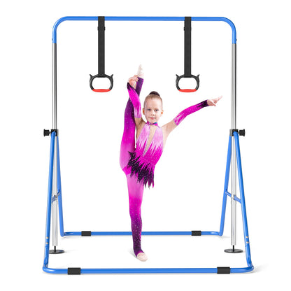 The gymnastic frame with a child in a leotard performing a vertical leg split