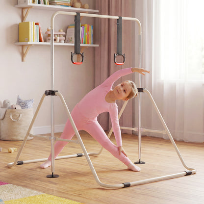 A girl in a pink leotard stretching on the gymnastic bar