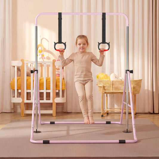 A young girl in beige clothing using the pink gymnastics bar