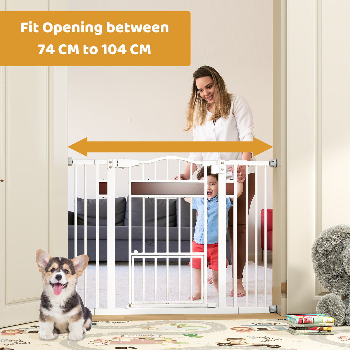 The white pet gate is installed in a doorway with a woman and child standing behind it