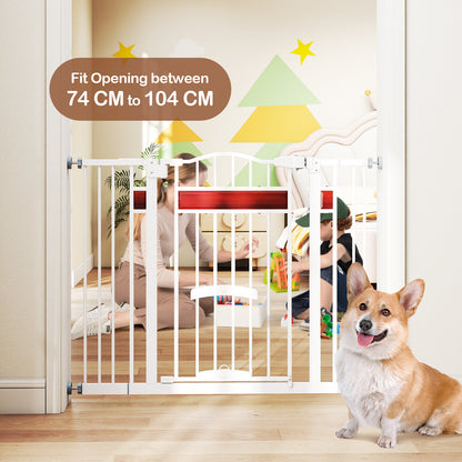 The white pet gate is installed in a doorway with children playing in the background and a corgi in the foreground