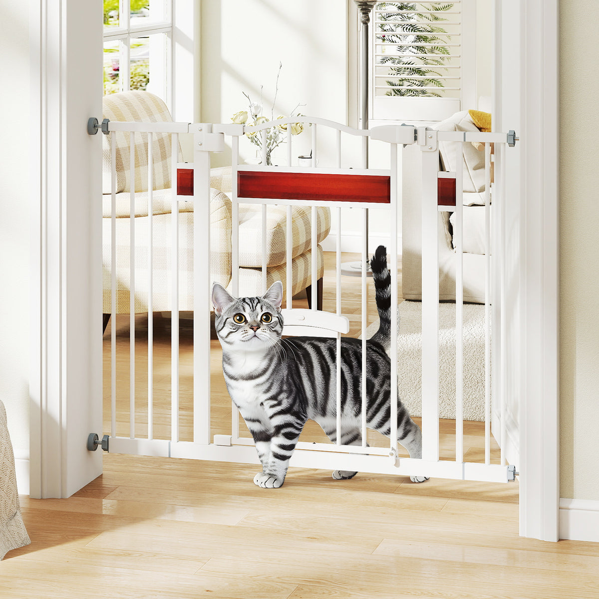 The white pet gate is open in a doorway, with a tabby cat walking through it