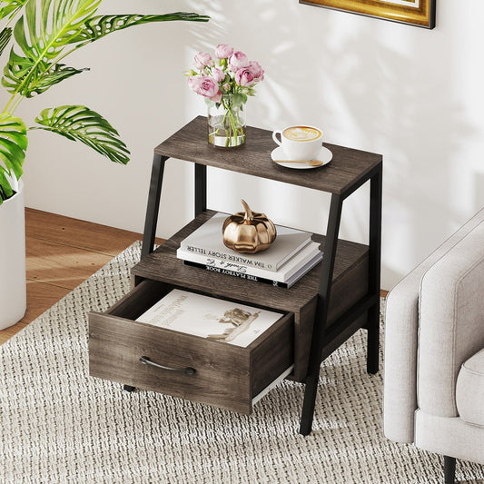 The grey wood effect nightstand with its drawer pulled open, showing storage space inside