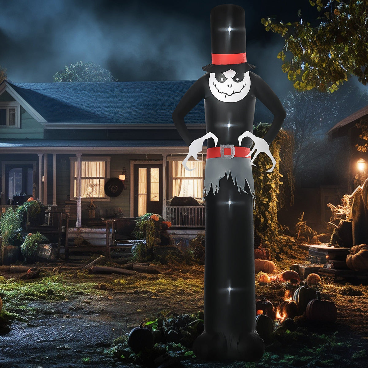 The tall Halloween inflatable ghost is displayed outdoors at night in a garden setting