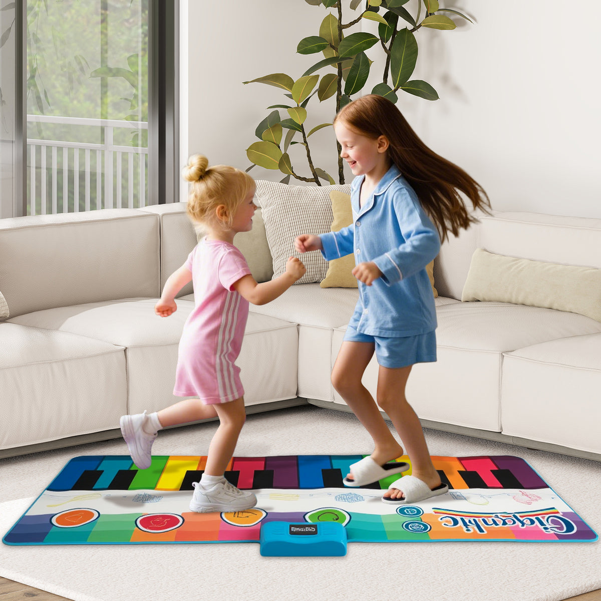 Two young girls jumping and playing on the musical floor mat in a bright living room