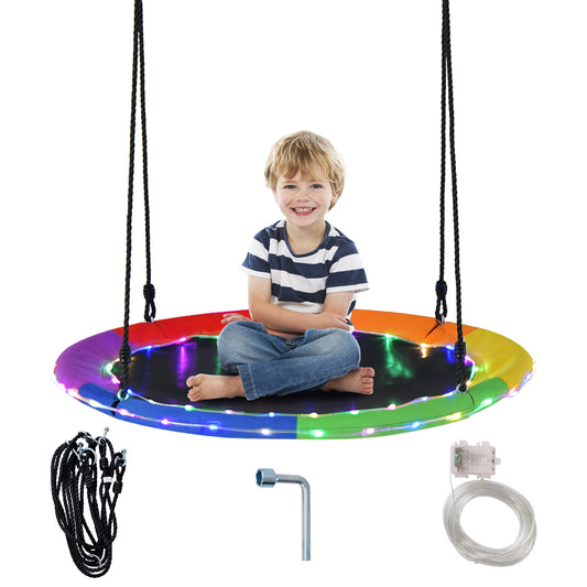 Flying Saucer Tree Swing with 8 light modes and adjustable hanging ropes-colourful, a child sits on the swing with lights on