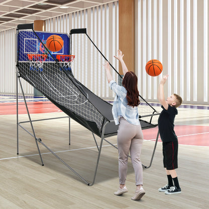 A boy and a woman playing the game room basketball arcade
