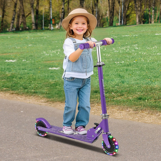A young girl riding the purple foldable kids scooter adjustable with lighted wheels and kickstand in a park