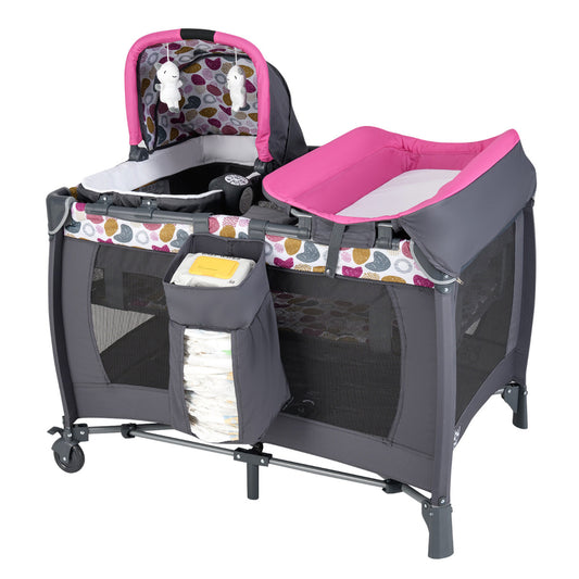 The portable baby playard with rocking bassinet and changing table attachment