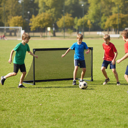Children playing soccer with the pop-up goal on a sports field