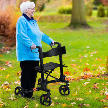 Elderly woman using the black mobility aid while walking in a park