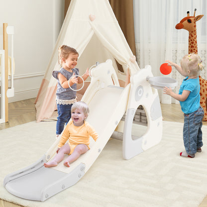 Grey foldable toddler slide with basketball hoop and ball set up indoors with children playing