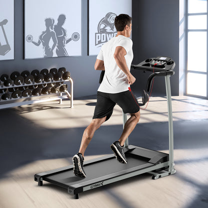 A man running on the treadmill in a room with gym equipment and motivational posters