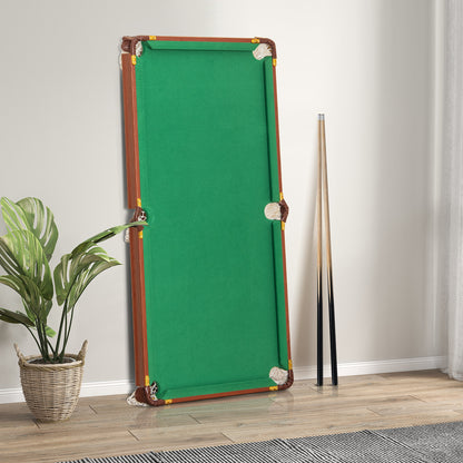 The folded billiards table leaning against a wall