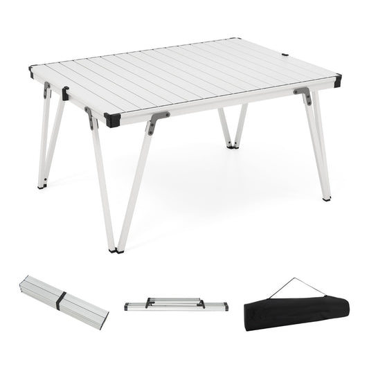 Folding Camping Table with Storage Bag and Waterproof Desktop set up with legs extended and a storage bag beside it