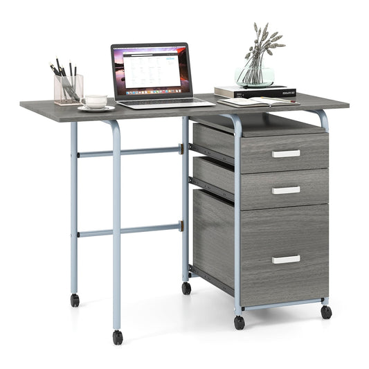 Folding Computer Desk with three drawers and rolling wheels, shown with a laptop and office accessories