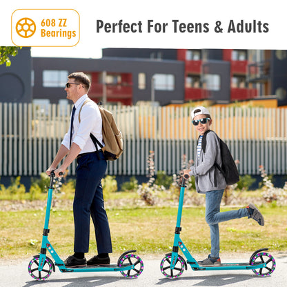 A man and a boy ride the turquoise scooters outdoors